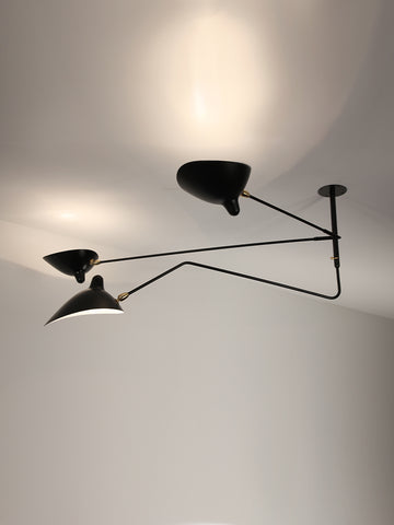 THREE-ARM, ONE CURVED ROTATING ARM CEILING LAMP